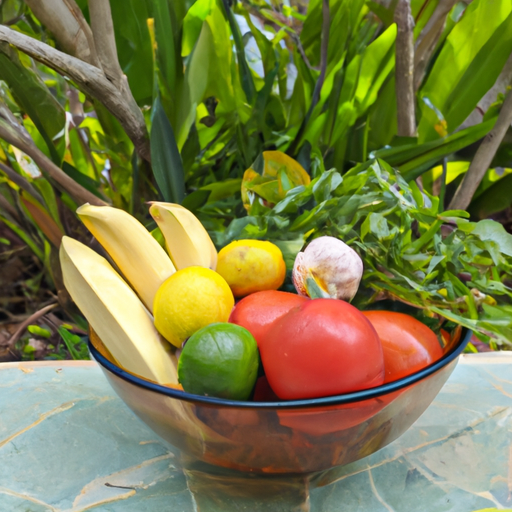 A bowl of fresh fruits and vegetables with a green leafy background.